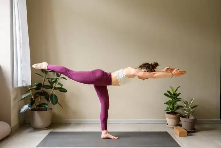 Achieving the Perfect Tone: How Often Should You Exercise for Results? 1 Woman doing Yoga exercise Kenilworth to help with toning the body.