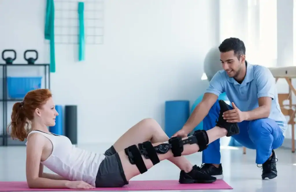 Debunking Meal Timing Myths: The Truth About Muscle Recovery 1 Woman having treatment to help muscle recovery Kenilworth after an injury