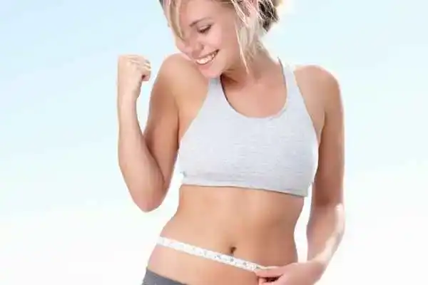 Unraveling the Mystery: Where Does the Body Fat Loss From First? 3 Image of woman happy with fat loss Kenilworth